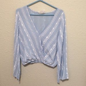 Blue blouse with flares sleeves